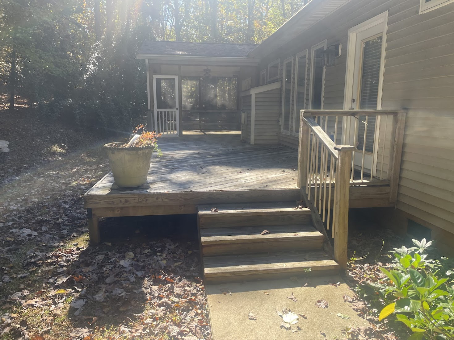 Real wood deck before pressure washing and restoration in Mebane NC